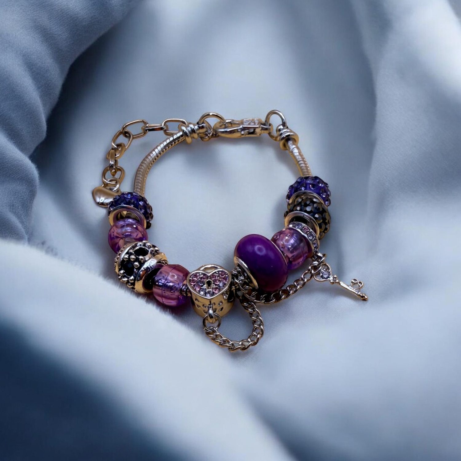 WDBGG2C? Purple Charm Bracelet